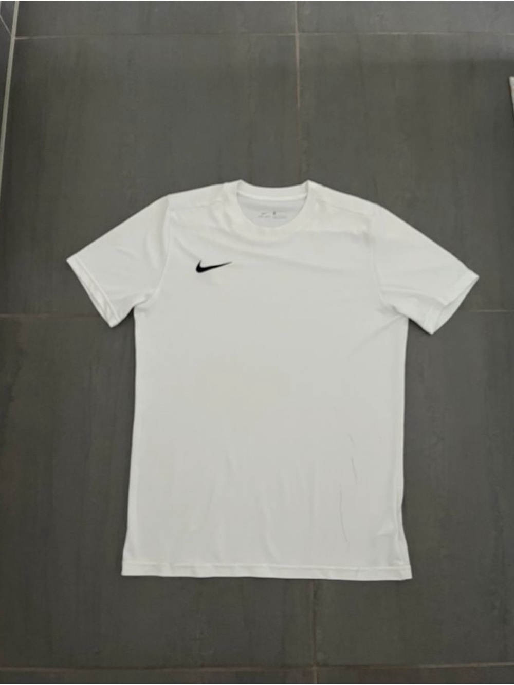 Nike White Short Sleeve Athletic Tee with Black Swoosh